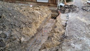 Excavated Footer with Rebar and Grade Stakes